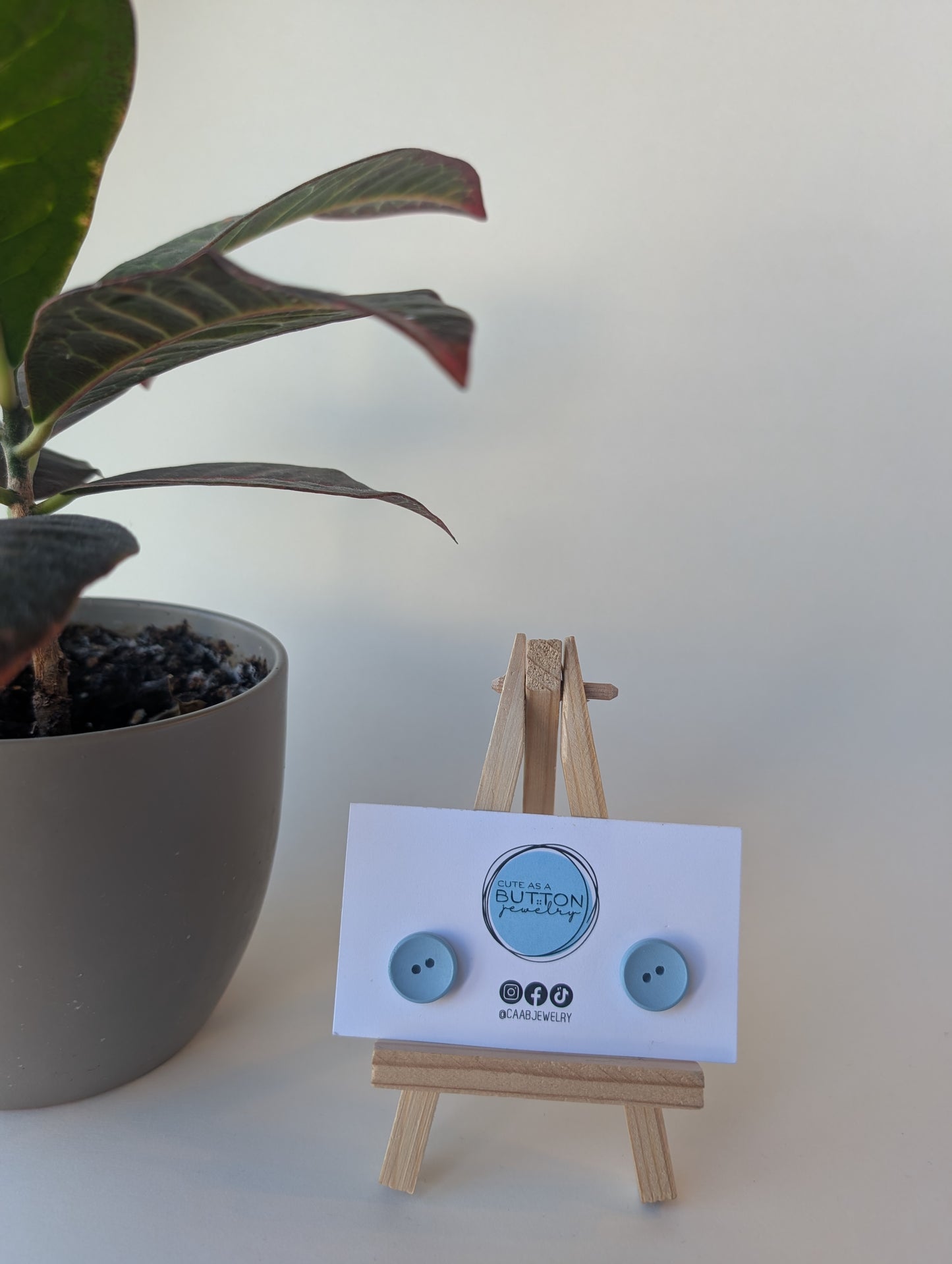 Light Blue Two-Hole Button Stud Earrings with Hypoallergenic Posts in Stainless Steel or Titanium